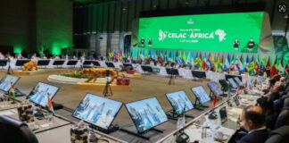 CARIBBEAN-St. Vincent and Guyana leaders address the CELAC summit. St Vincent Prime Minister Godwin Friday and Guyana Prime Minister Mark Phillips address the X CELAC Summit at the Agora Convention Center in Bogota Colombia on March 21 2026 calling for an end to the US embargo on Cuba and emphasizing regional unity climate action and South-South cooperation