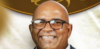 GRENADA–New political party to unveil candidates for upcoming election. Interim Chairman Alister Bain addresses delegates and supporters at the Democratic People's Movement's first congress at the Grenada Trade Centre in Morne Rouge on March 22, 2026, as the new political party announces its first cadre of parliamentary candidates for the upcoming general election