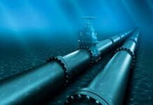 GUYANA-Guyana is examining a second gas-to-energy project. ExxonMobil Guyana President Alistair Routledge stands before a map showing the proposed US$2 billion pipeline route for Guyana's second Gas-to-Energy project in Berbice, which could involve a shared pipeline infrastructure with neighboring Suriname