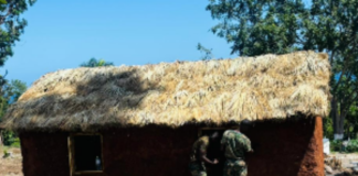 JAMAICA-Ghana hands over traditional homes to Jamaica. Jamaica Culture Minister Olivia Grange and Foreign Affairs Minister Kamina Johnson-Smith stand with Ghana Army Colonel Emmanuel Asia at Seville Heritage Park in St Ann during official handover ceremony of two traditional African mud houses with open kitchen constructed by Ghana Army Reconstruction Team