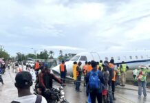 HAITI– Plane goes off-runway at airport in Les Cayes. An IBC Airways Embraer 145 aircraft rests off the runway on the northeast shoulder near National Road 7 at Antoine-Simon Airport in Les Cayes, Haiti, after veering off during landing in heavy rain on March 20, 2026