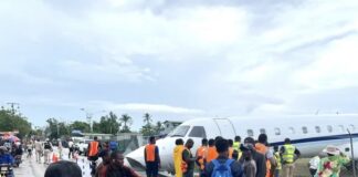 HAITI– Plane goes off-runway at airport in Les Cayes. An IBC Airways Embraer 145 aircraft rests off the runway on the northeast shoulder near National Road 7 at Antoine-Simon Airport in Les Cayes, Haiti, after veering off during landing in heavy rain on March 20, 2026