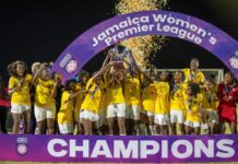 FOOTBALL-JWPL leads to opportunities for over a dozen women. Jamaica Women's Premier League players at media launch celebrating as Christina Hudson PWFJL chairperson announces 12 players secured university scholarships and 2 earned professional contracts from past season