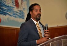 ST KITTS-Opposition legislator arrested following police search. St Kitts and Nevis opposition legislator Dr Terrance Drew stands outside the Basseterre Police Station after being released on station bail following a police search at his constituency office and home that he described as an "abuse of power" targeting him for political reasons