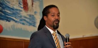 ST KITTS-Opposition legislator arrested following police search. St Kitts and Nevis opposition legislator Dr Terrance Drew stands outside the Basseterre Police Station after being released on station bail following a police search at his constituency office and home that he described as an "abuse of power" targeting him for political reasons