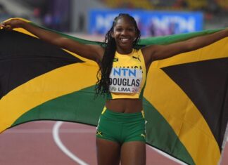 ATHLETICS-Douglas runs world-leading U18 200m time at CARIFTA trials.