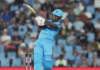 CRICKET-Rutherford gets £100, 000 payday with MI London. West Indies batsman Sherfane Rutherford celebrates after being snapped up by MI London for £100,000 in the inaugural Hundred auction at London's Piccadilly Lights on March 12 2026