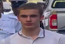 ST. VINCENT-Court delays sentencing of British national on drug charges. British national Warren-Lee Davies leaves the Serious Offences Court in Kingstown, St. Vincent, on March 23, 2026, after his sentencing for drug trafficking was delayed, following his March 20 guilty plea to possession of 3 kilograms of cocaine at Argyle International Airport