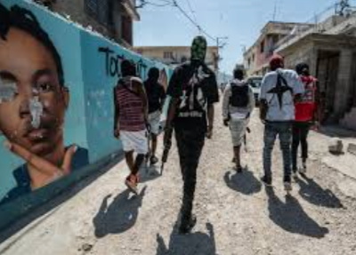 gangs-in-Haiti US Department of State Rewards for Justice program poster offering up to $3 million and possible relocation for information on financial activities of Haiti's Viv Ansanm gang coalition and Gran Grif, both designated as Foreign Terrorist Organizations
