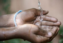 BAHAMAS-CDB welcomes GCF approval for its major climate resilience investment for the Bahamas. Caribbean Development Bank Director of Projects L. O'Reilly Lewis and Water and Sewerage Corporation General Manager Robert Deal celebrate after the Green Climate Fund approved US$65.2 million for the Climate Resilience of the Water Sector project in The Bahamas, a seven-year initiative to protect freshwater resources and modernize critical infrastructure across six islands