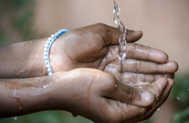 water-bahamas Caribbean Development Bank Director of Projects L. O'Reilly Lewis and Water and Sewerage Corporation General Manager Robert Deal celebrate after the Green Climate Fund approved US$65.2 million for the Climate Resilience of the Water Sector project in The Bahamas, a seven-year initiative to protect freshwater resources and modernize critical infrastructure across six islands