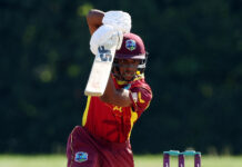 ST. LUCIA-The quiet hunger of Akeem Auguste. Akeem Auguste practicing cricket shot with focused expression on St. Lucia ground
