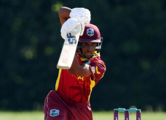 ST. LUCIA-The quiet hunger of Akeem Auguste. Akeem Auguste practicing cricket shot with focused expression on St. Lucia ground