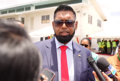 Ali-on-carla President Ali at podium defending CARICOM SG reappointment process