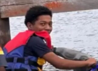 GUYANA-Body of a student recovered from the lake. Emergency responders near lake during student body recovery in Guyana