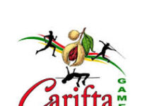 ATHLETICS-Jamaica on track to win 40th consecutive title. Jamaican athletes celebrating on track after relay race