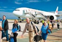 Barbados is described as one of the safest destinations in the Caribbean and the Americas. Tourists enjoying safe beach in Barbados Caribbean