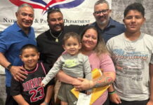 BELIZE-Belizeans receive passports under a government initiative to attract nationals in the diaspora. Prime Minister John Briceño and Immigration Minister Kareem Musa hand over Belizean passports to over 300 nationals during the PassBack ceremony in Houston, Texas, as part of the government's mobile hub initiative to serve Belizeans living abroad