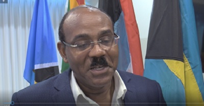 Browne-Caricom PM Browne signing letter to international election observers