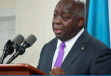 BAHAMAS-PM welcomes launch of new trade initiative Bahamas Prime Minister shaking hands with business leaders at trade initiative launch