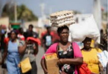 HAITI-World Bank focuses on Haiti’s development challenges. World Bank officials reviewing Haiti development reports on screen