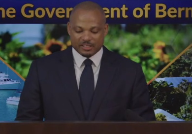 Hayward-fairpay Bermuda government official announcing pay transparency law at press conference