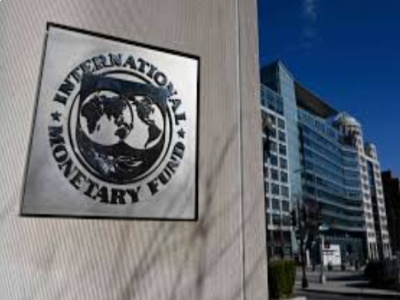 IMF-SMPS IMF and Haiti officials reviewing economic progress charts