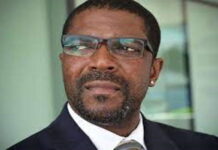 BERMUDA-Bermuda launches national cybersecurity risk assessment. Minister of National Security Michael Weeks stands at a podium in the House of Assembly in Hamilton, Bermuda, announcing the launch of Bermuda's inaugural National Cybersecurity Risk Assessment (NCRA), a digital survey instrument designed to gather cybersecurity risk intelligence from public and private sectors across the jurisdiction