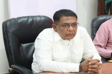 Mustapha-Brazil Guyana and Brazil agriculture officials shaking hands at bilateral meeting