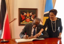TRINIDAD-ST. Lucia PM pays a courtesy visit and attends the funeral of a ruling party official.