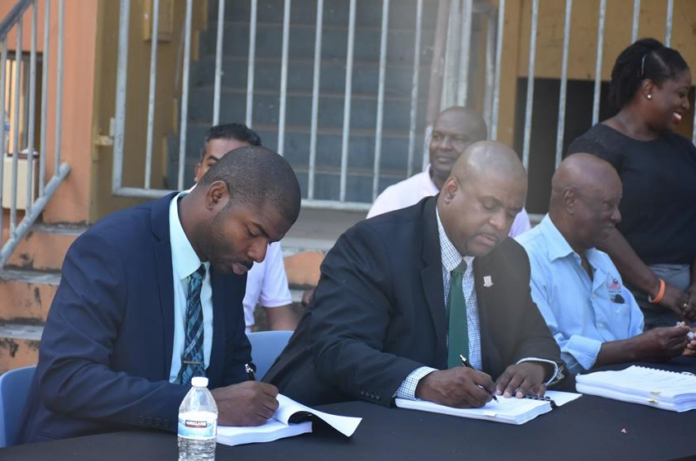 Wheatley speaking at press conference defending former Premier outside VIP headquarters