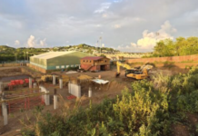 SWIMMING-SLAF withdraws bid to host 2027 Swimming Championships. SLAF official announcing bid withdrawal at press conference with swimming logo in background