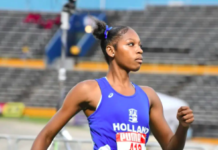 ATHLETICS-Douglas blazes to 10.98, becomes fourth-fastest Jamaican junior in champs history.