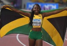 ATHLETICS-Douglas, Simmons set track ablaze in swansong performances. Douglas and Simmons celebrating final CARIFTA race with medals