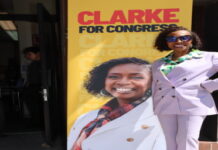 UNITED STATES-Caribbean, American Congresswoman launches reelection campaign. Caribbean-American congresswoman waving to crowd at campaign launch event