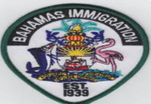 BAHAMAS-Caribbean nationals accused of running afoul of immigration laws. Bahamas immigration officers escorting individuals from detention center