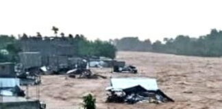HAITI-Devastating floods leave at least 12 dead in Northwest Haiti. Rescue workers navigating flooded streets in Northwest Haiti after deadly floods
