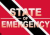 TRINIDAD-Schoolboy among persons detained under SoE detention orders. Trinidad police officers escorting detained schoolboy under State of Emergency orders