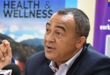 JAMAICA-Government to expand cancer care treatment islandwide. Doctor and patient at hospital with cancer treatment equipment
