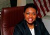 UNITED STATES-Caribbean-American congresswoman condemns Supreme Court ruling on Voting Rights Act. Caribbean-American congresswoman speaking at press conference with Voting Rights Act document