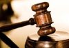 ST. KITTS-Man found guilty of offering cash to a woman who made a rape complaint against another person. Man in court with judge and legal representatives, victim not pictured