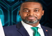 BERMUDA-Bermuda welcomes KBRA ratings. Bermuda government official shaking hands with KBRA representative