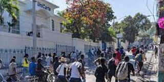 HAITI-IACHR is concerned about the escalating violence in Haiti. IACHR logo with Haiti flag and rising violence graph in background