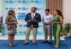 CARIBBEAN-CDB to establish “Impact Room” in the Bahamas. CDB officials and Bahamas minister cutting ribbon for new Impact Room facility