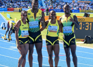 ATHLETICS-Jamaica grabs mixed relay gold in world record time.