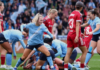 FOOTBALL-Shaw off target, but Man City one win away from WSL title. Bunny Shaw reacting after missed shot as Man City players celebrate late win