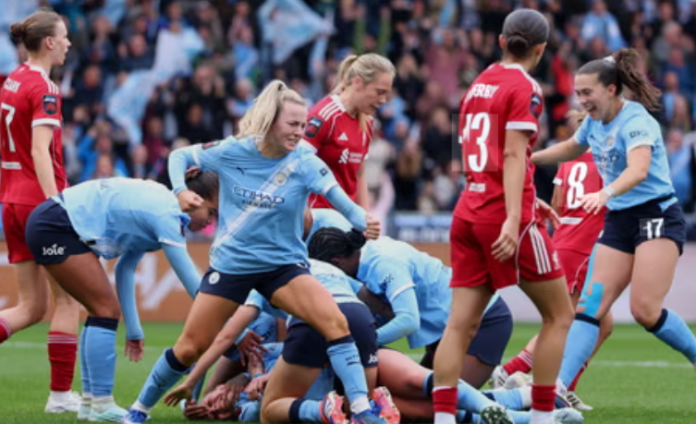 Bunny Shaw reacting after missed shot as Man City players celebrate late win