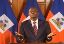 HAITI-Four persons convicted of conspiracy to murder the former Haitian leader. Defendants standing in Haitian courtroom with judge announcing verdict