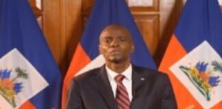 HAITI-Four persons convicted of conspiracy to murder the former Haitian leader. Defendants standing in Haitian courtroom with judge announcing verdict