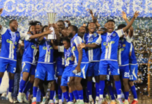 FOOTBALL-Three teams already locked in as 2026 Caribbean Cup draw date set. Caribbean Cup trophy with three team flags and calendar marking draw date